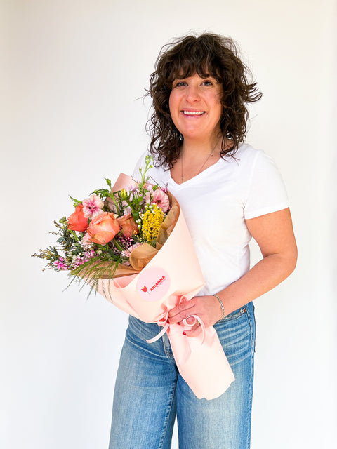 Boulder wrapped  flower arrangement